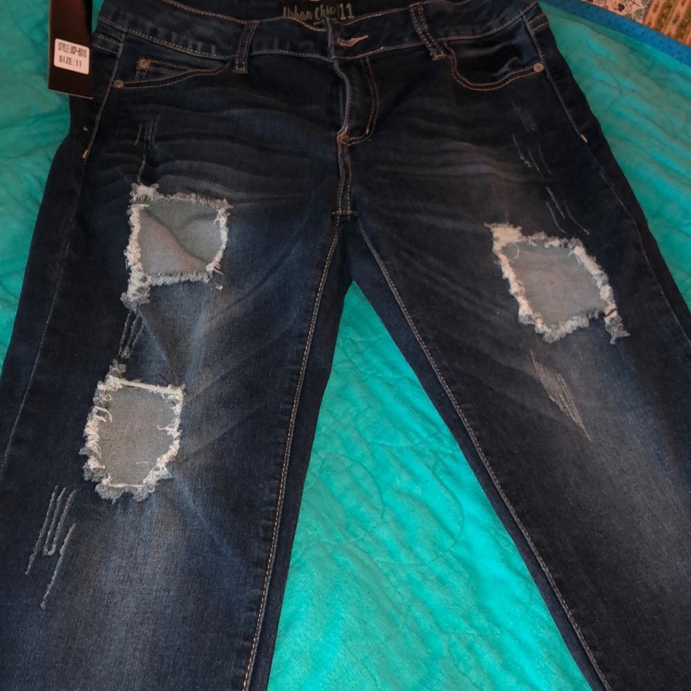 Never worn Distressed jeans